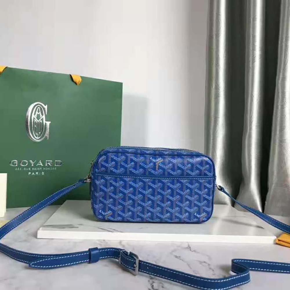 Close-up of blue leather trim and silver hardware on Goyard Cap-vert Pm Bag