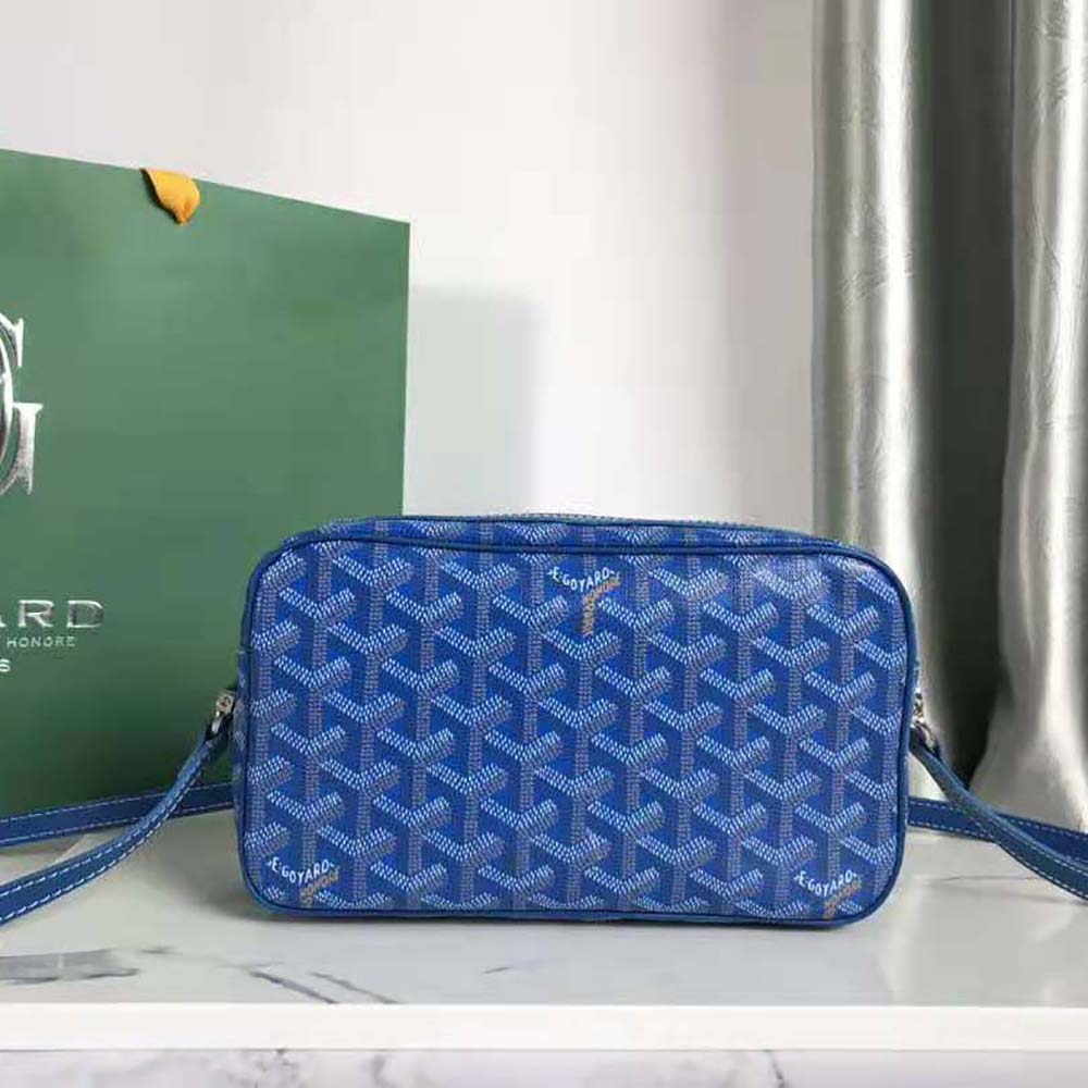Side angle of Goyard Unisex Cap-vert Pm Bag-Blue highlighting compact silhouette