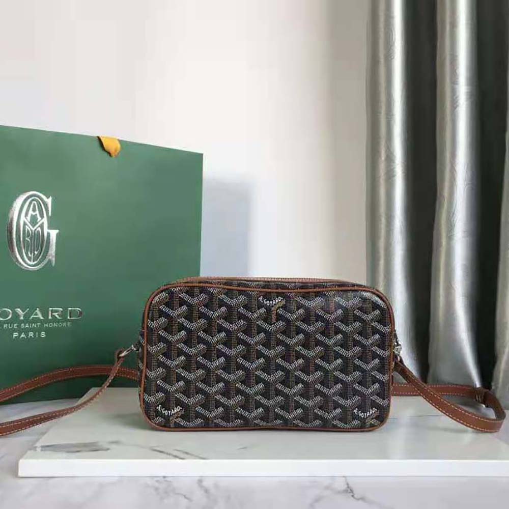 Side view of compact silhouette for Goyard Unisex Cap-vert Pm Bag-Brown