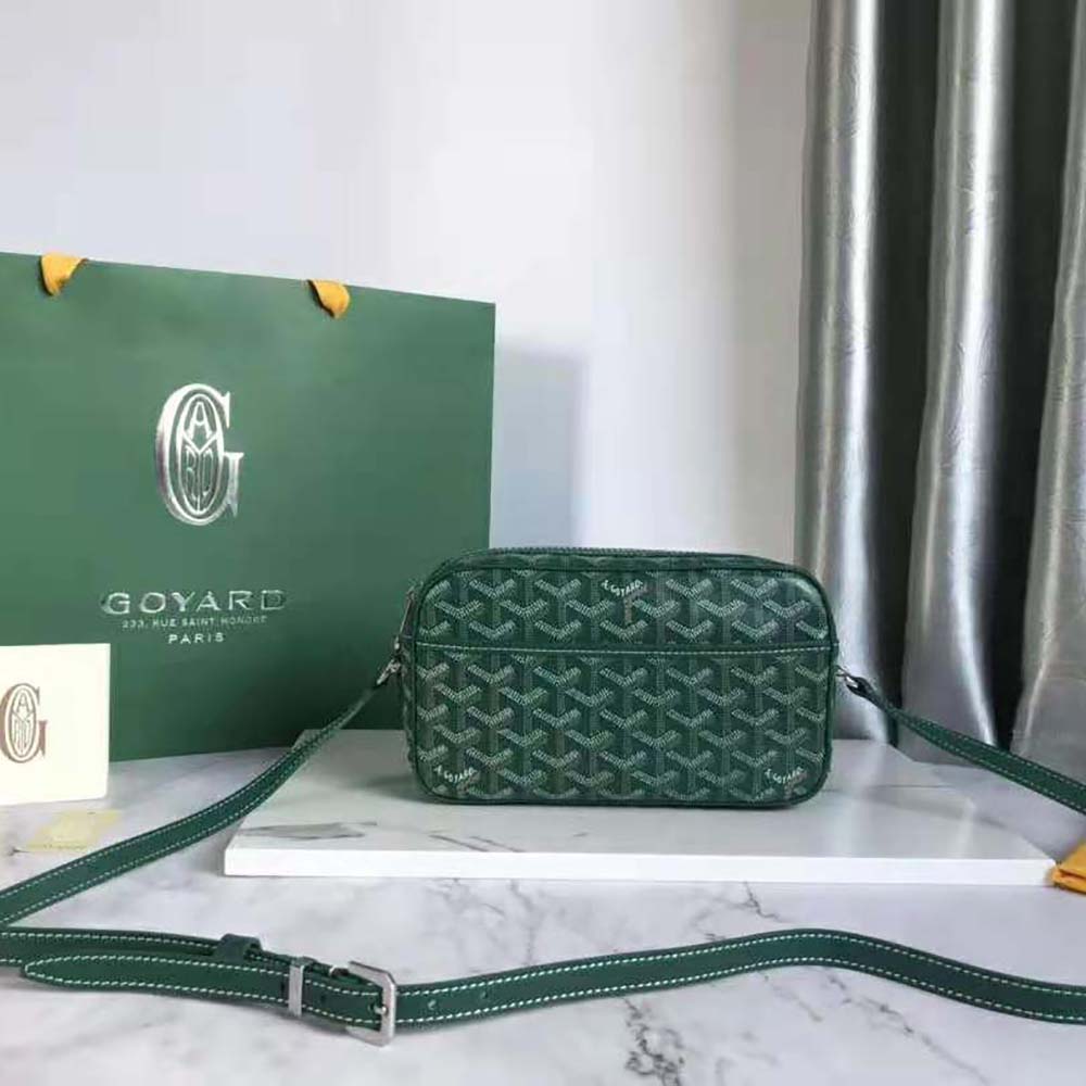 Close-up of brass hardware and embossed logo on Goyard Cap-vert Pm Bag-Green