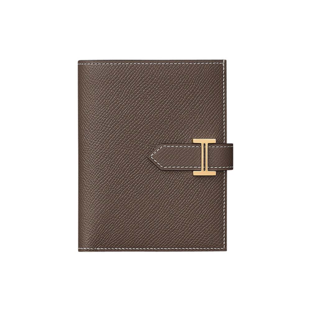 Close-up of gold hardware detail on Hermes Men Bearn Compact Wallet