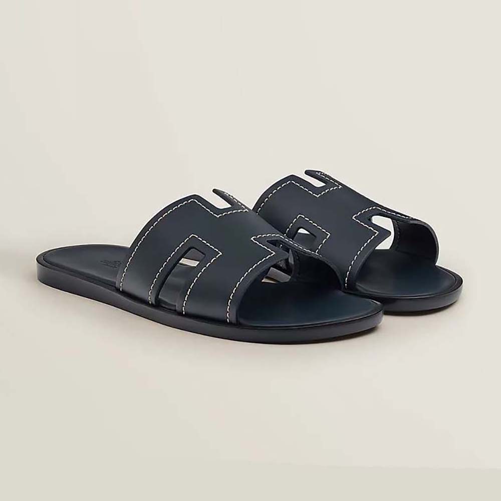 Side view of Hermes Men Izmir Sandal in blue calfskin leather