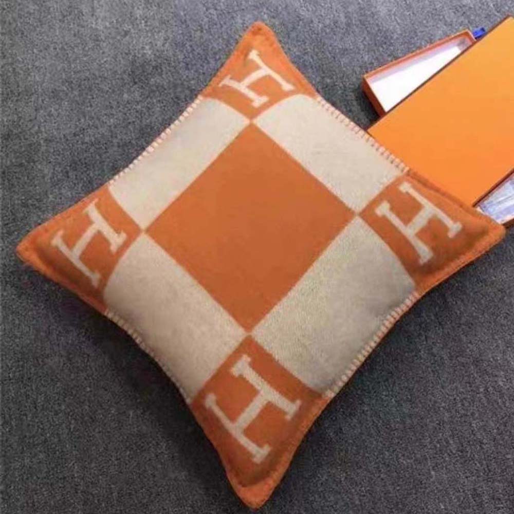 Close-up of embossed Hermes logo detail on Avalon Pillow Large Model-Orange