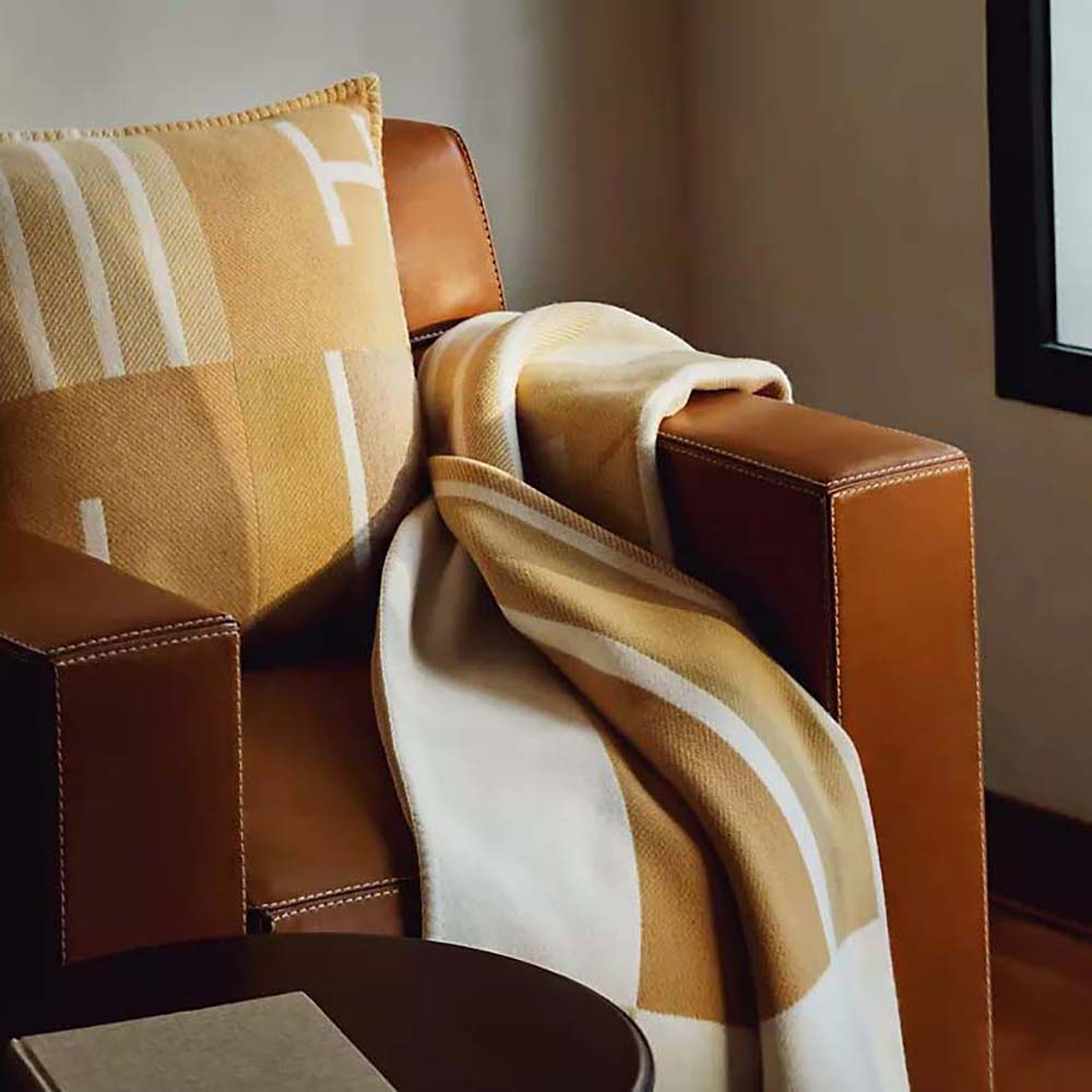 Side angle showing rich brown shade of Hermes Unisex Avalon Vibration Throw Blanket-Brown