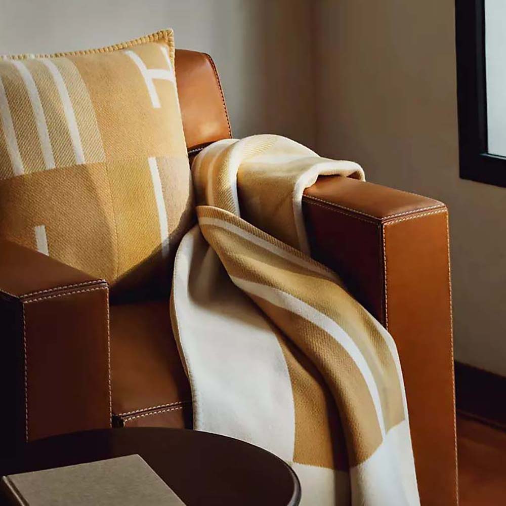 Folded Hermes Unisex Avalon Vibration Throw Blanket-Yellow showing stitching
