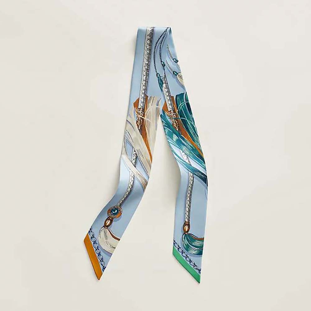 Front view of Hermes Women Cavalcades Twilly-Blue silk scarf