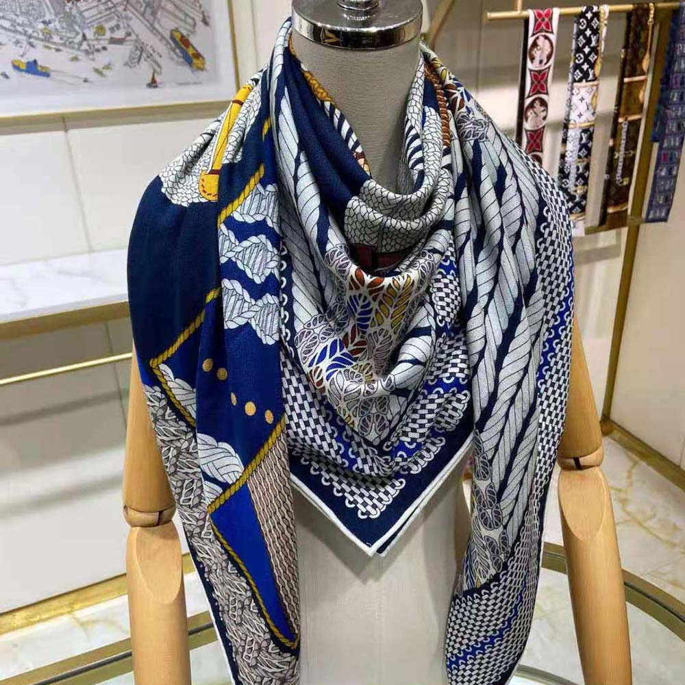 Model wearing Hermes Women Dressage Tressage Shawl 140-Navy around neck