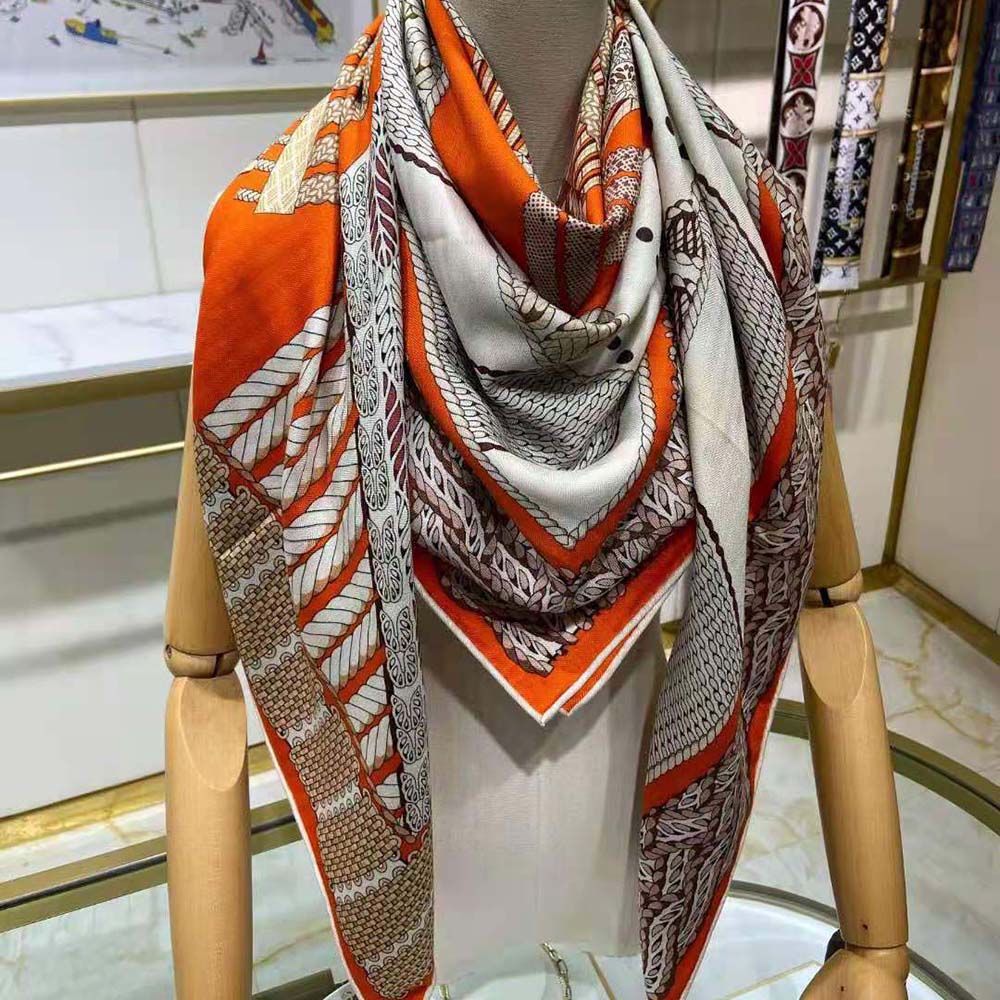 Close-up detail of braided tressage pattern on Hermes Women Dressage Tressage Shawl 140-Orange