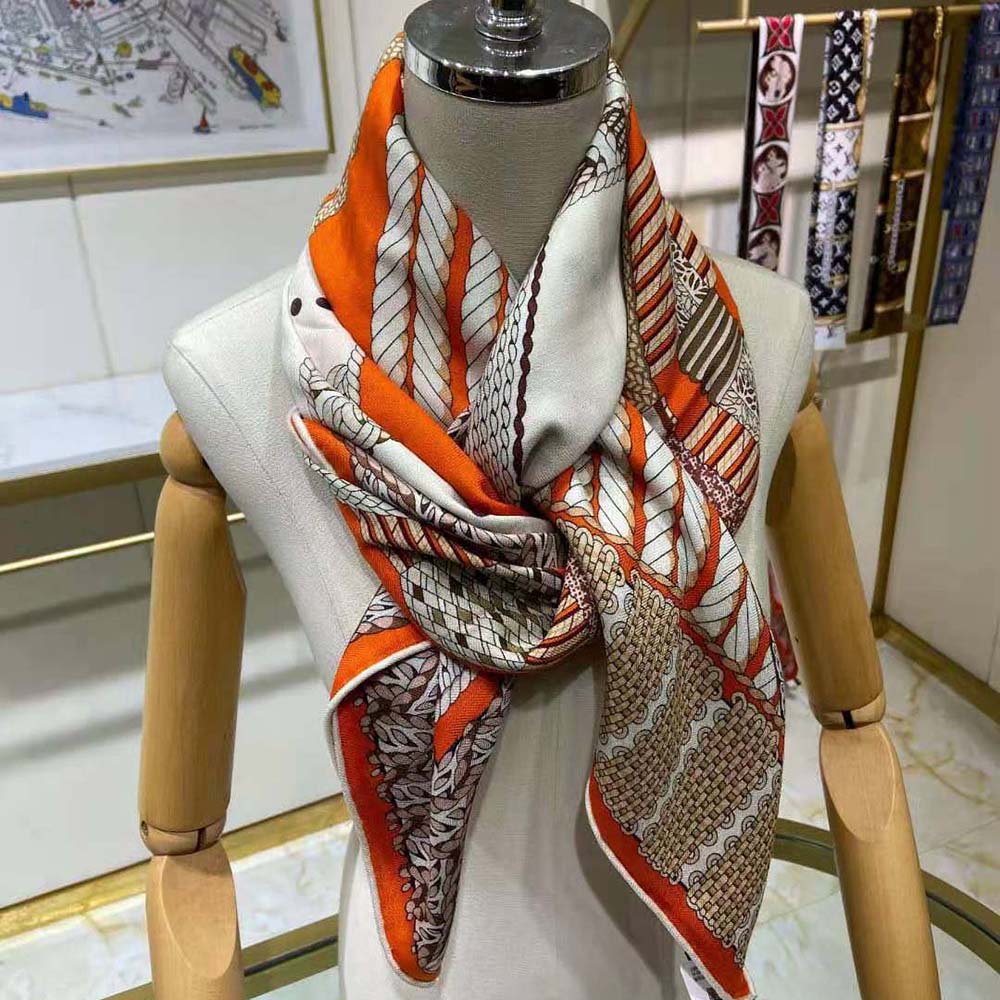 Styled draped shoulders with Hermes Women Dressage Tressage Shawl 140-Orange vibrant orange color