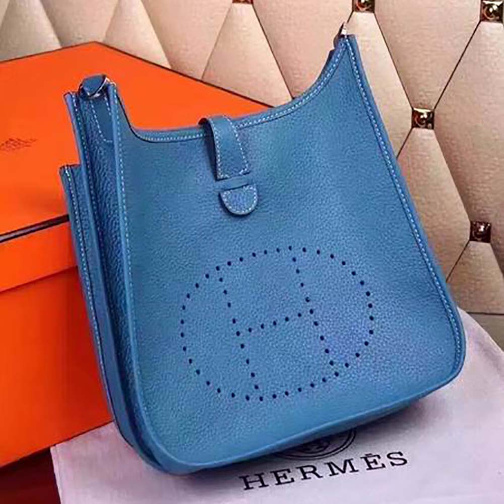Close-up of silver-tone perforated H detail on Evelyne 16 bag