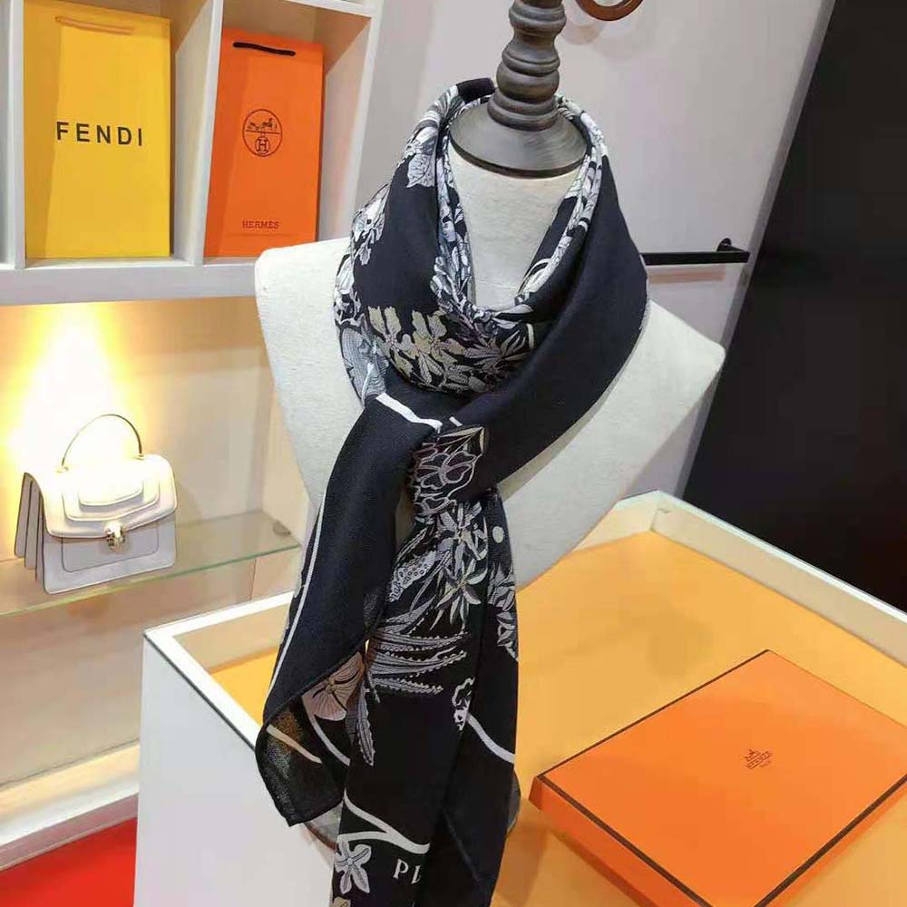 Model wearing Hermes Women Planifleurs Scarf 90-Black loosely wrapped around neck