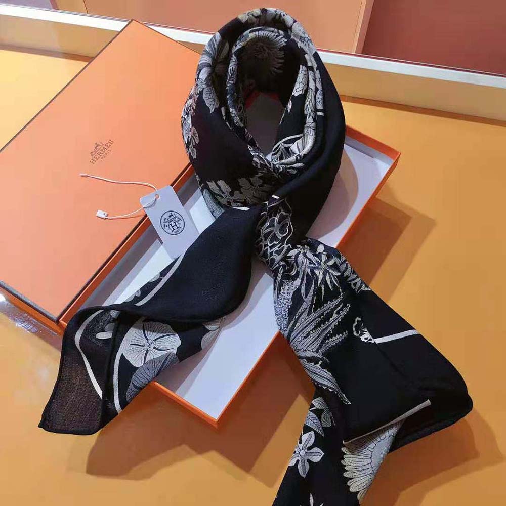 Hermes Women Planifleurs Scarf 90-Black neatly folded showing hand-rolled edges