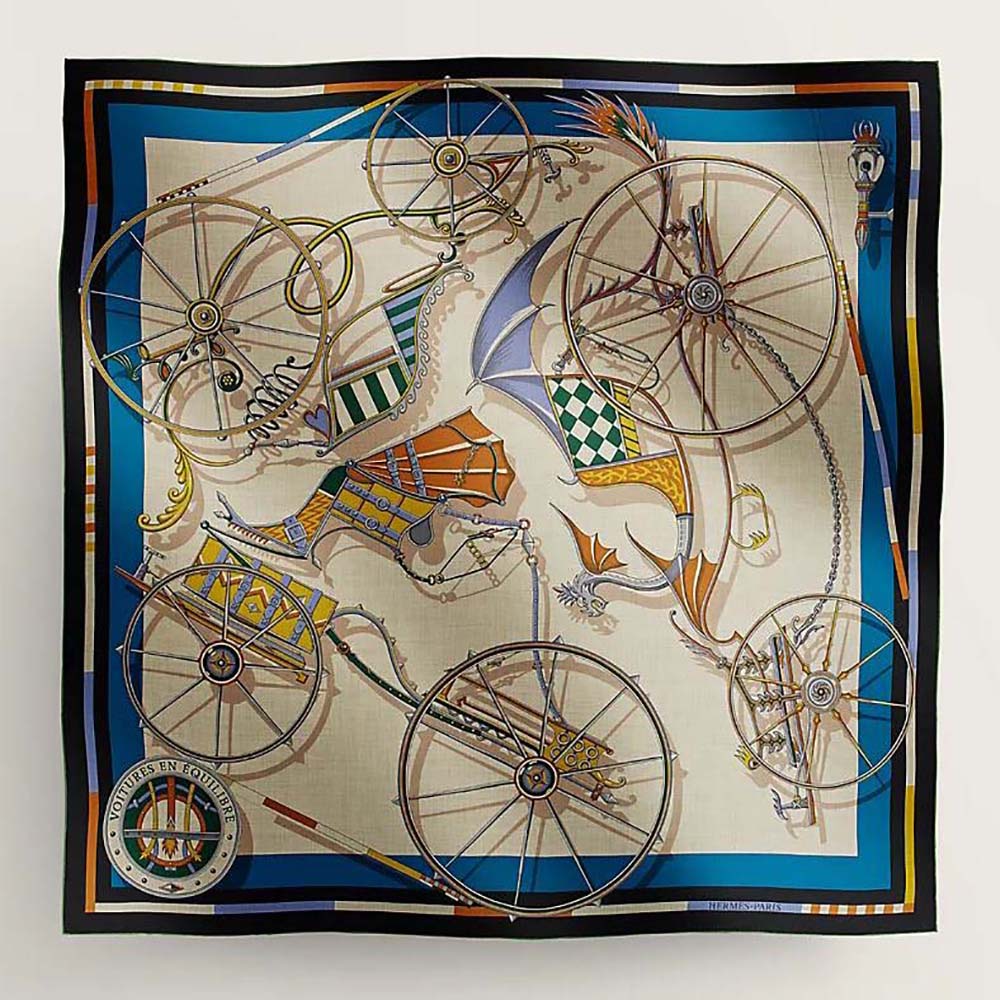 Front view of Hermes Women Voitures En Equilibre Shawl 140-Navy draped neatly