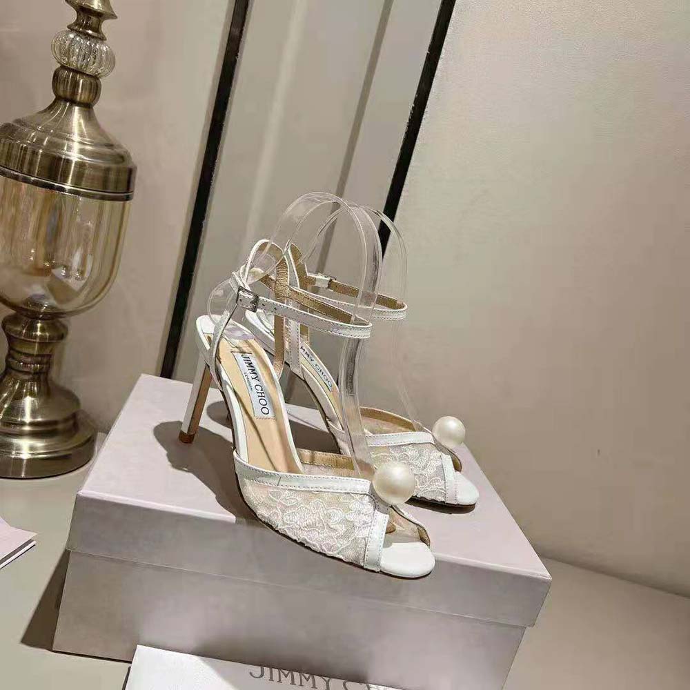Overhead view showing lace texture and buckle on Jimmy Choo Women Sacora 85 Sandals