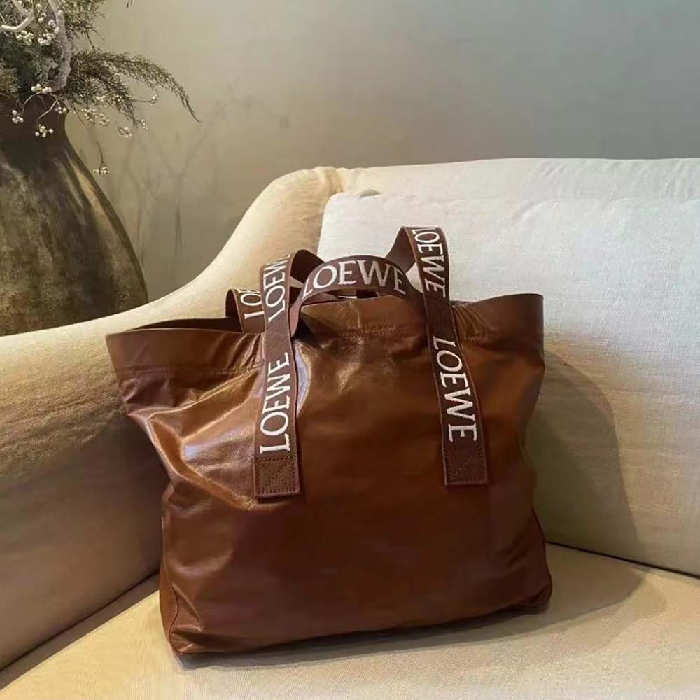Close-up of brown paper calfskin texture on Loewe Fold Shopper