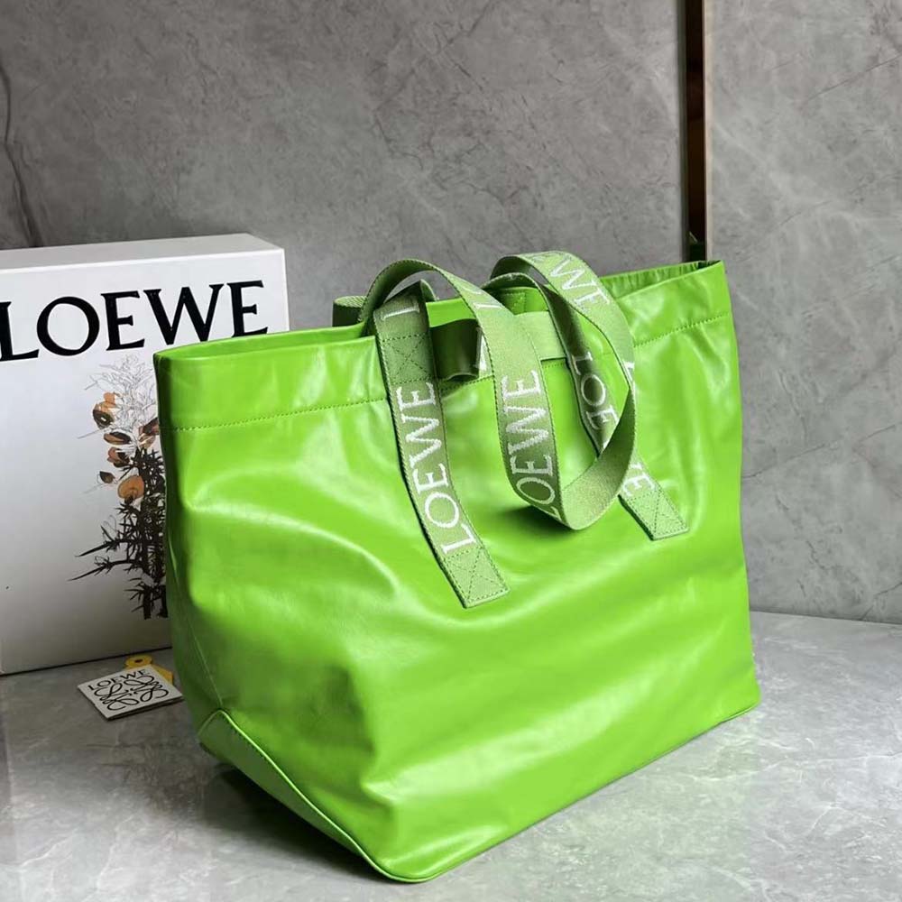 Side angle showing fold silhouette of Loewe Unisex Fold Shopper