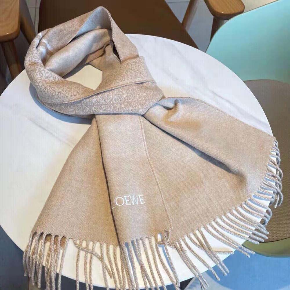 Loewe Unisex Scarf in Wool and Cashmere-Brown draped over mannequin shoulder