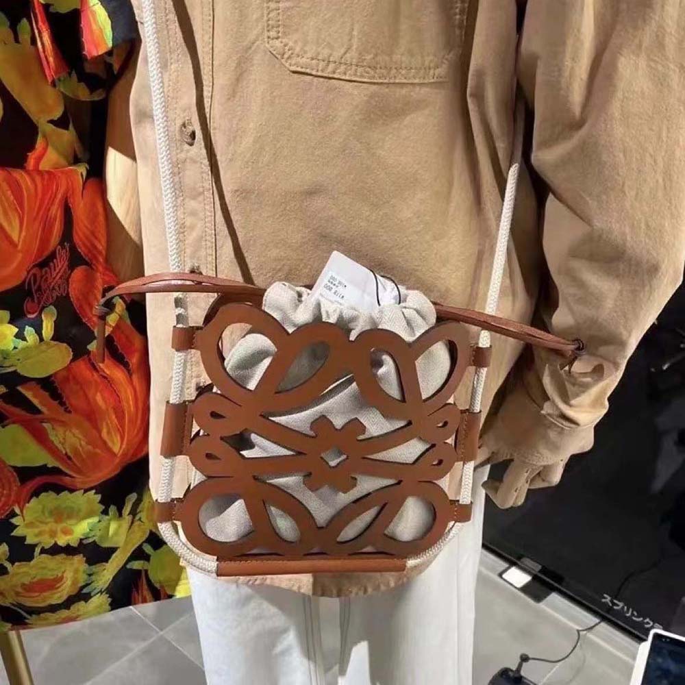 Side angle showing adjustable strap on Loewe Women Anagram Cut-out Crossbody