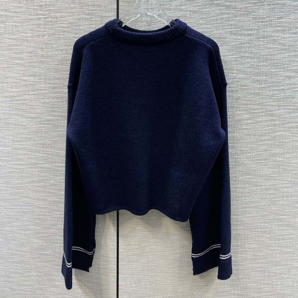 Side angle showing ribbed hem on Loewe Wool-Navy Cropped Sweater