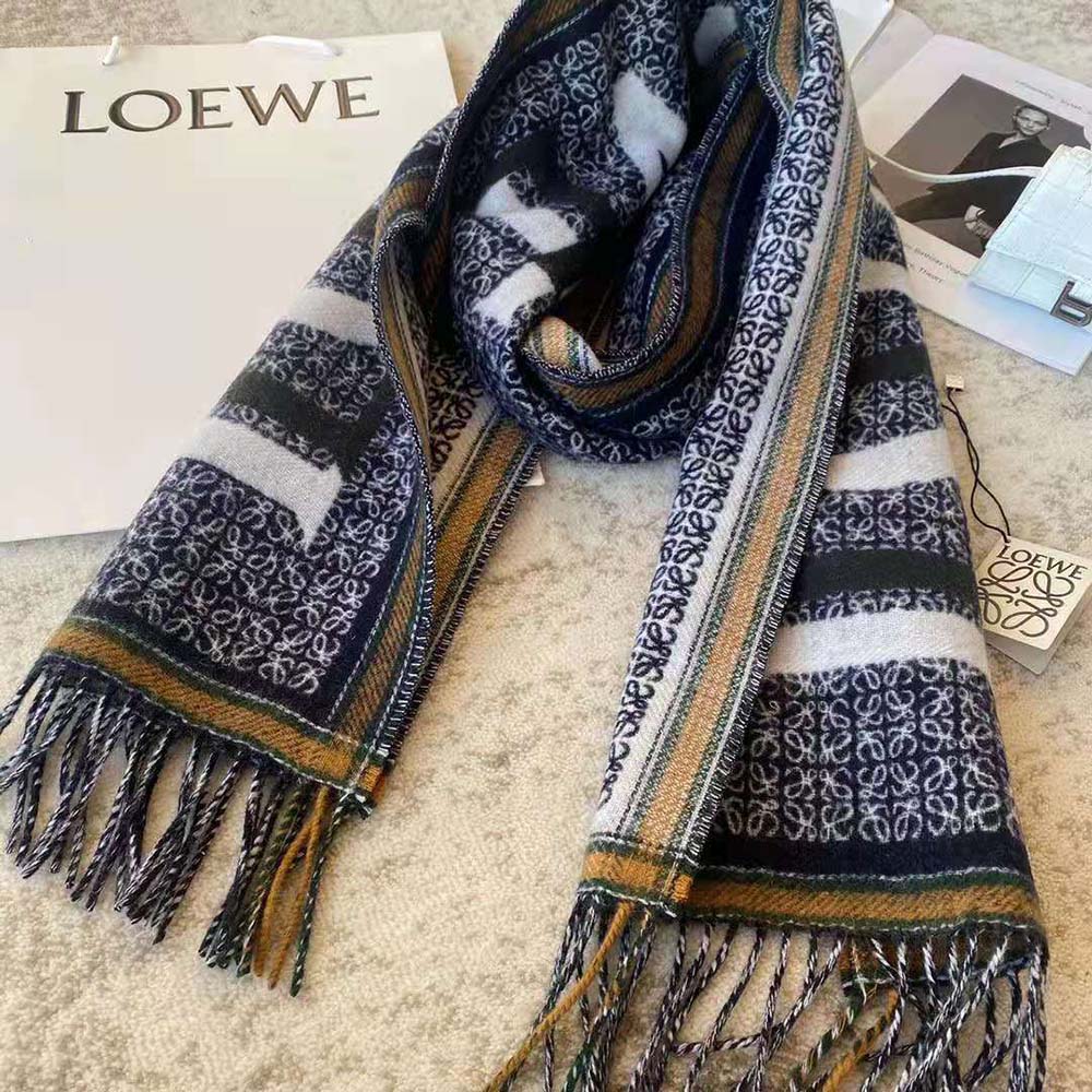 Close-up detail of embossed LOEWE Love logo on black scarf