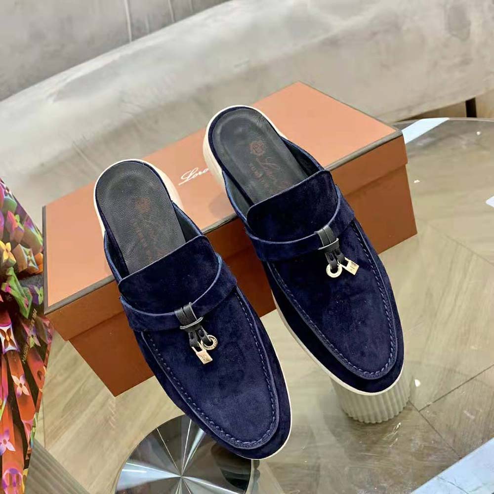 Close-up of navy leather and charm hardware on Loro Piana Unisex Babouche Loafers