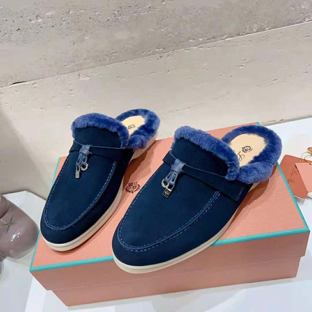 Top view showing navy suede and slip-on design of Loro Piana loafers
