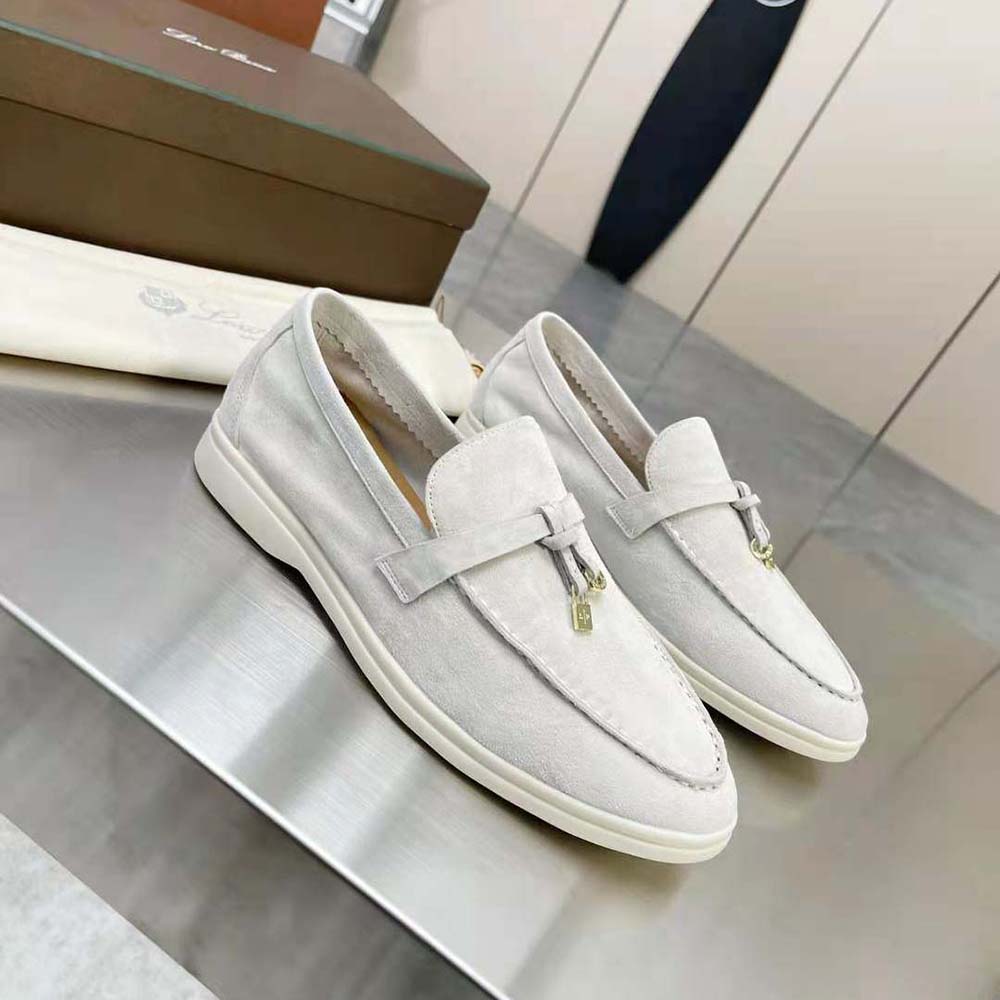 Close-up on silver summer charm detail on Loro Piana Summer Charms Walk Loafers-White