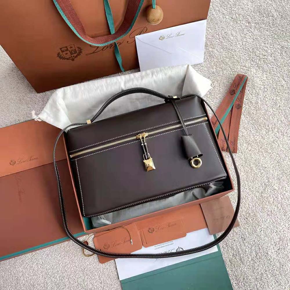 Side angle highlighting flap closure on Loro Piana Women Extra Bag