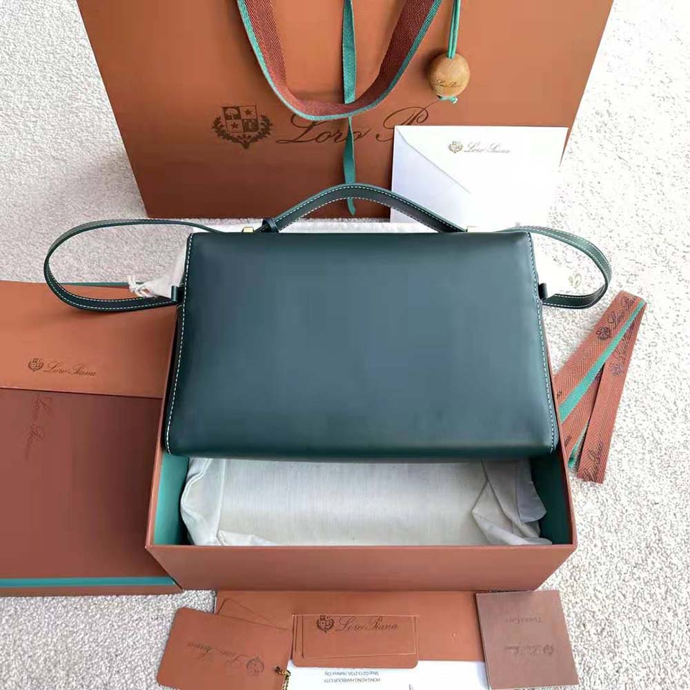 Side profile showcasing silhouette of Loro Piana Women Extra Bag green