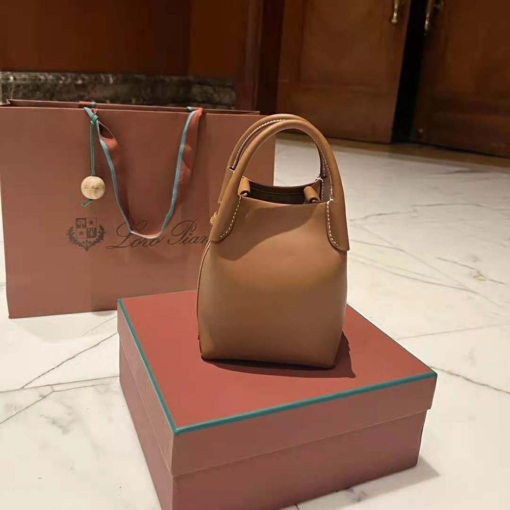 Close-up of polished gold-tone hardware on Loro Piana Micro Bale Bag