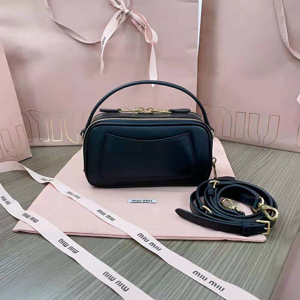 Side profile showing silhouette of Miu Miu Women Arcadie Leather Bag black leather