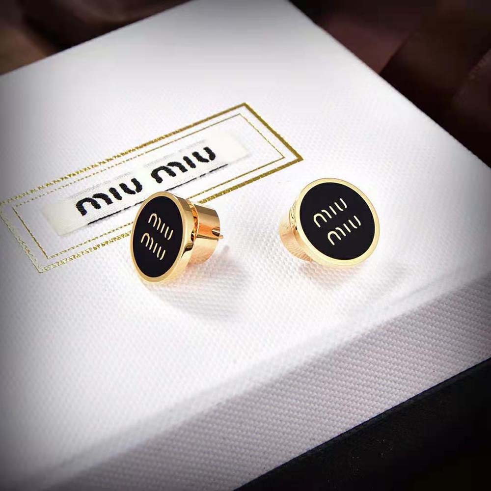 Side profile showing compact silhouette of Miu Miu Women Enameled Metal Earrings