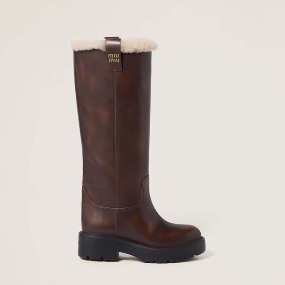 Side view of Miu Miu Women Fumé Leather Boots-Brown showing zip detail