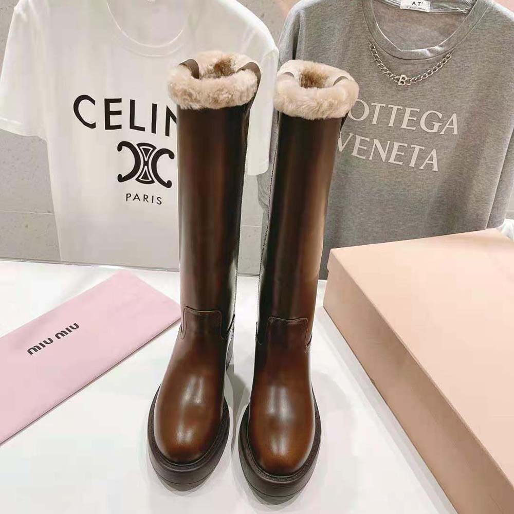 Close-up of fumé brown leather texture on Miu Miu Women Fumé Leather Boots-Brown