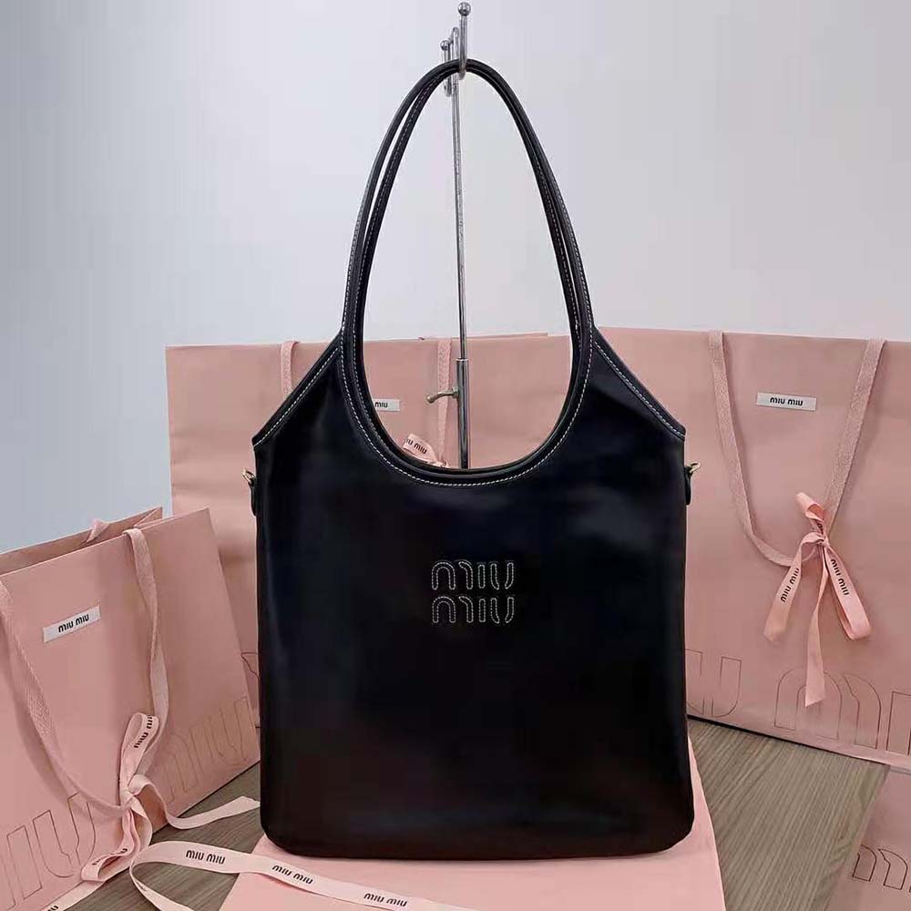 Close-up detail of black leather lettering logo on Miu Miu Women IVY Bag
