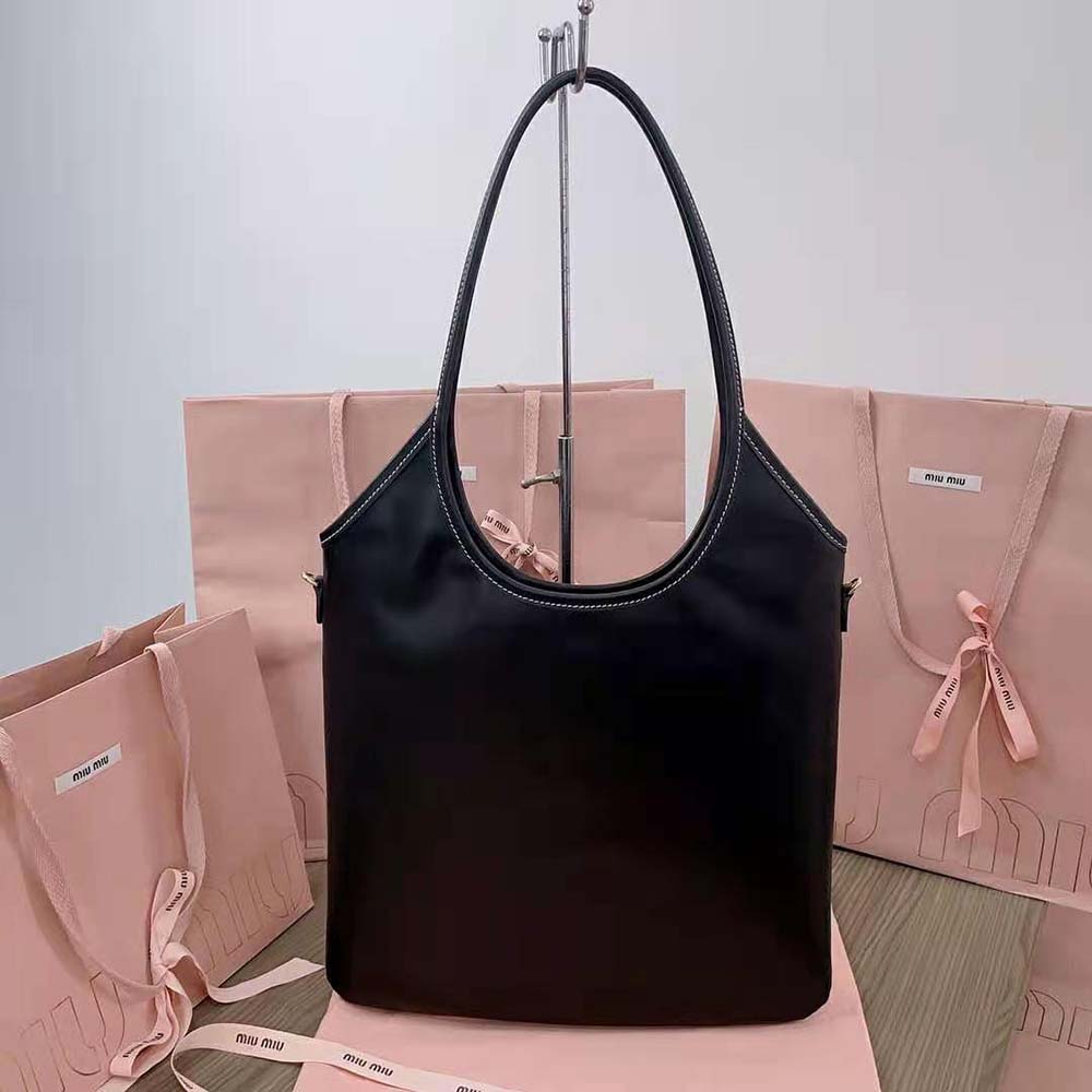 Side view showing silhouette and silver hardware of Miu Miu Women IVY Bag