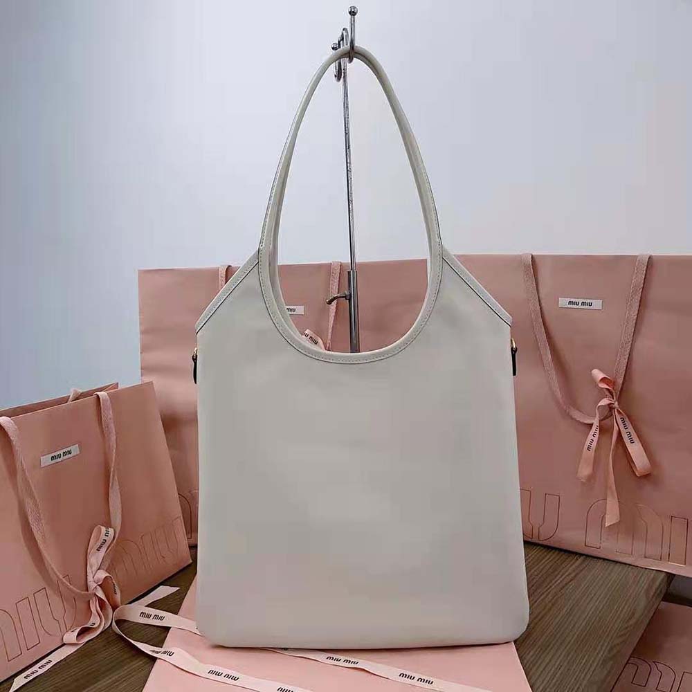 Side angle showing polished silver hardware on Miu Miu Women IVY Leather Bag