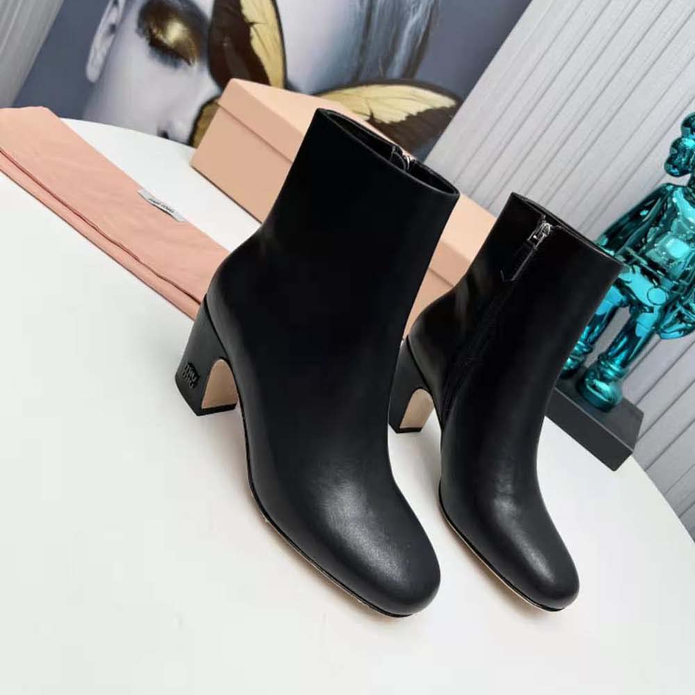 Top view showing zipper closure on Miu Miu Women Leather Booties Black