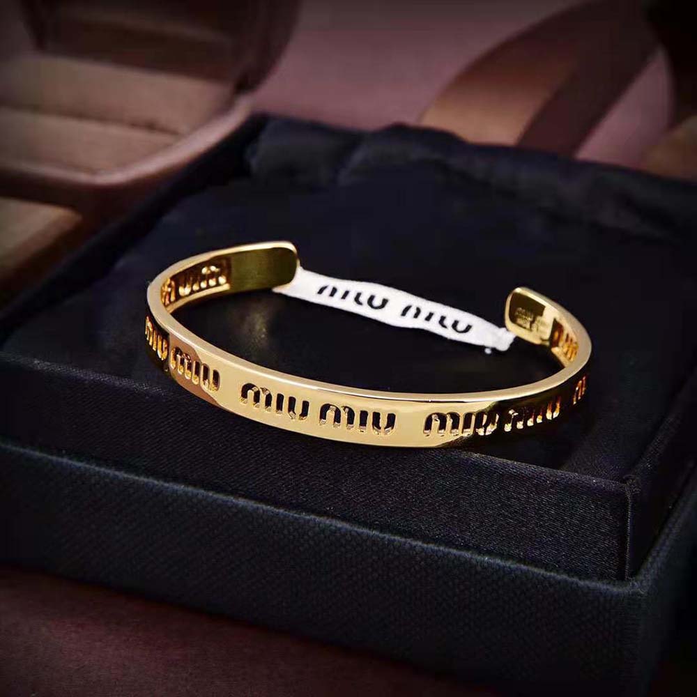Side view of Miu Miu Women Metal Bracelet showing slim silhouette