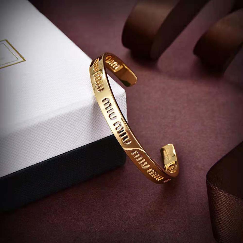 Miu Miu Women Metal Bracelet elegantly styled on wrist