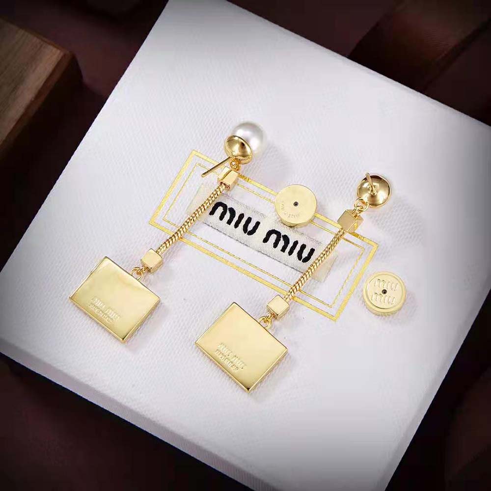 Detail view of push-back closure on Miu Miu Women Metal Earrings