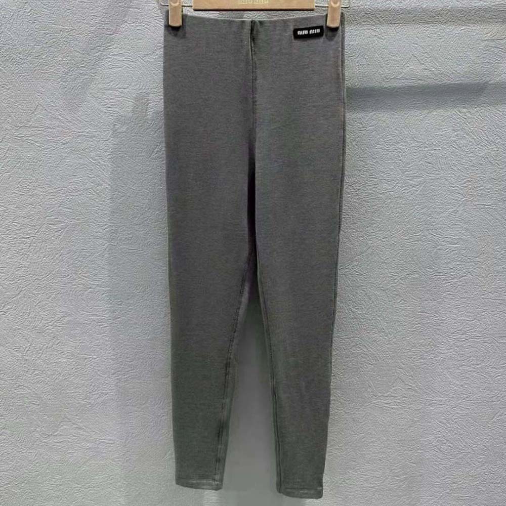 Close-up of logo patch detail on Miu Miu Women Silk Jersey Pants