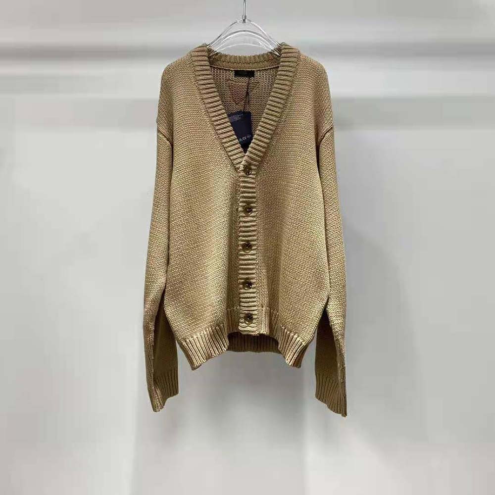 Close-up of knit triangle logo detail on Prada Women Camel Hair Cardigan