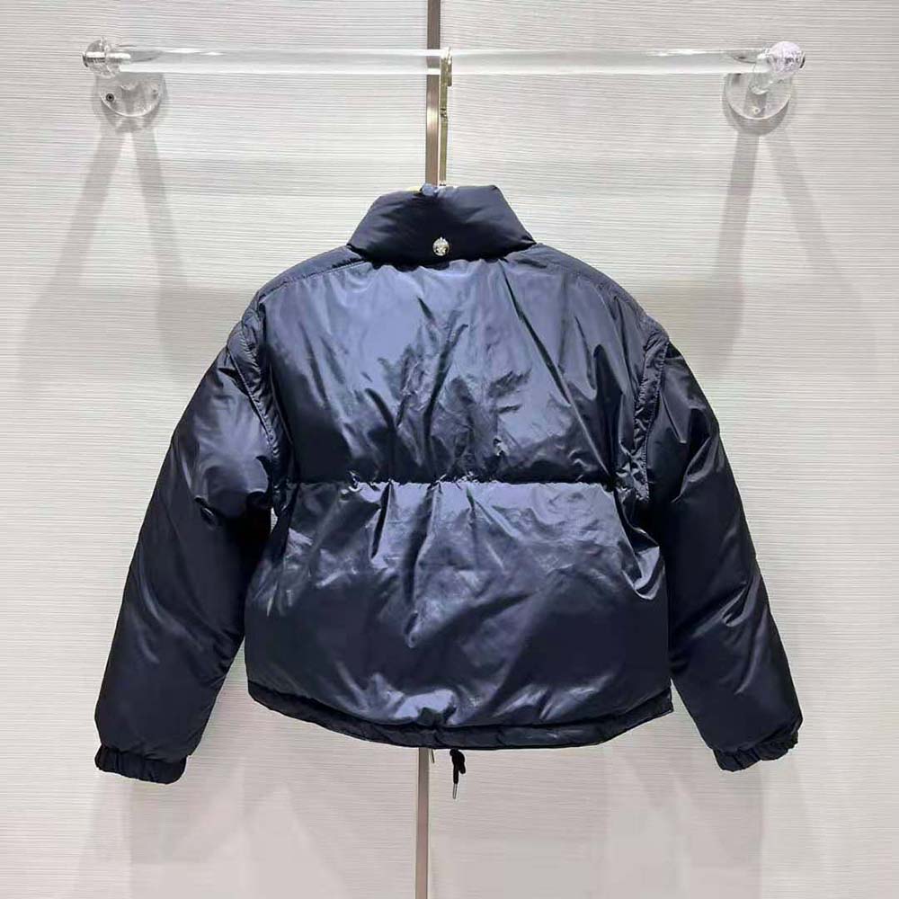 Side profile showing silhouette of Prada Women Cropped Re-Nylon Down Jacket-Black