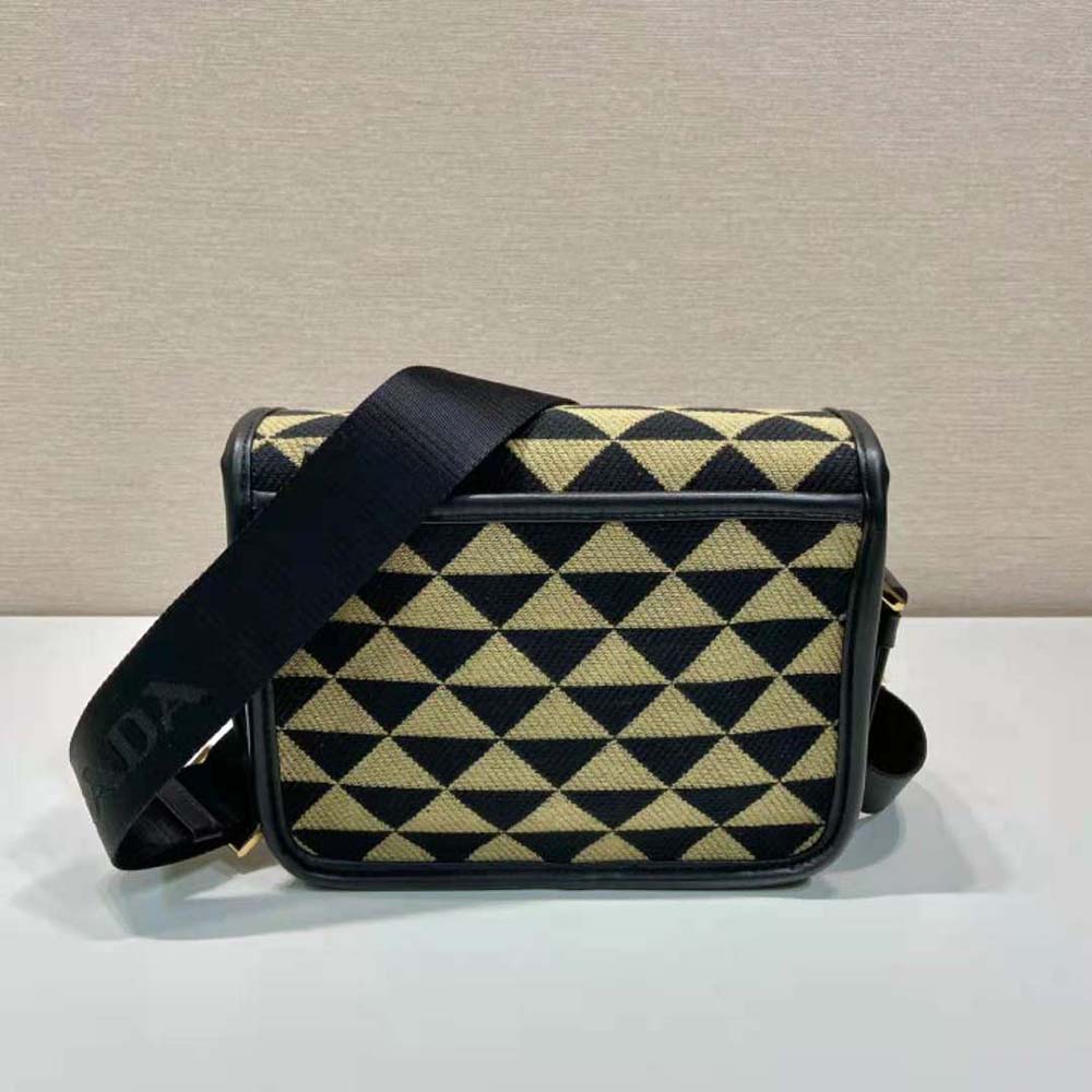 Side view highlighting zipper and strap of Prada Men Symbole Embroidered Fabric Bag