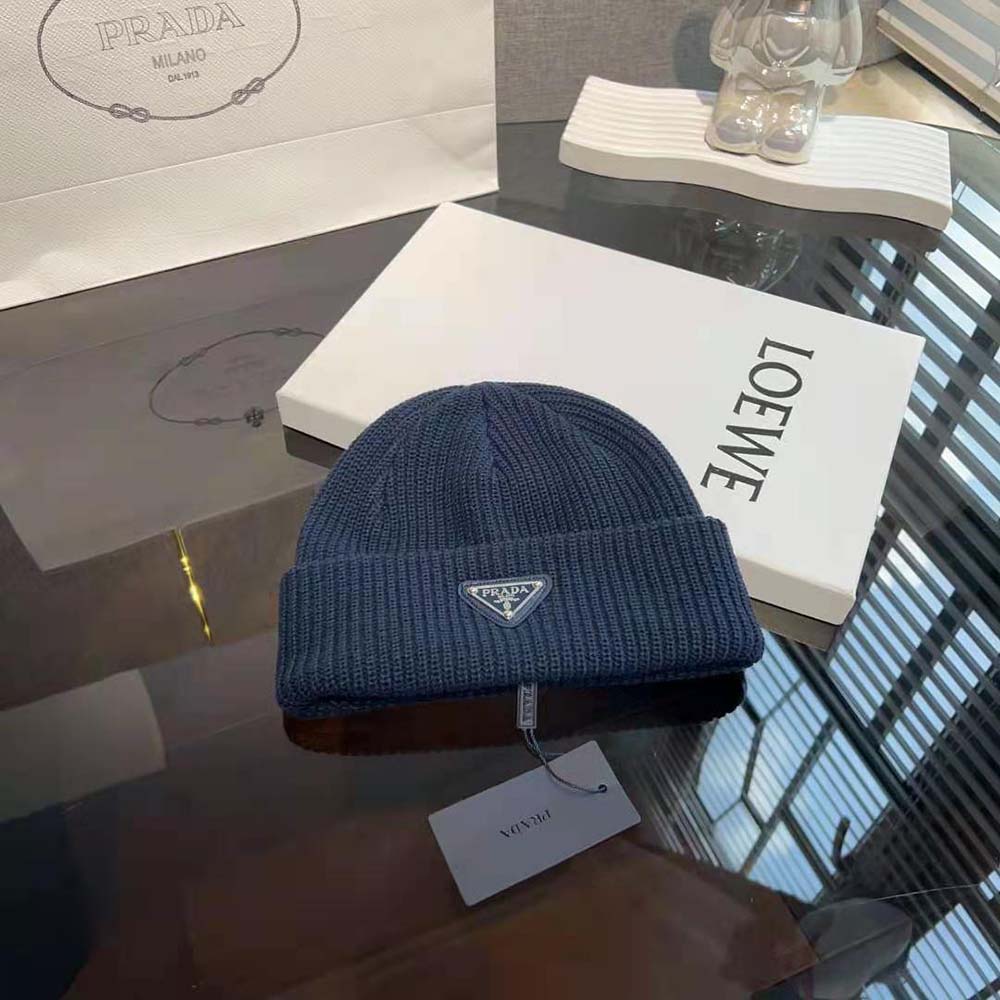 Side angle showing subtle Prada logo detail on black beanie