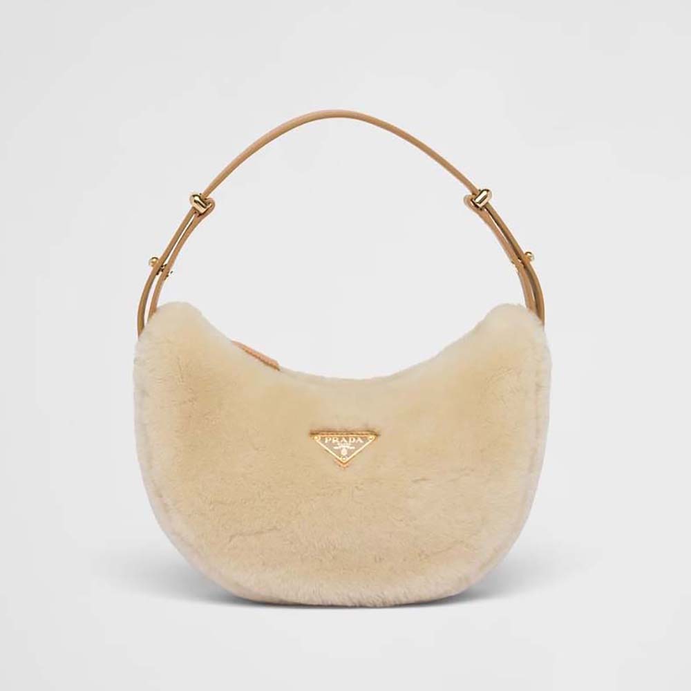 Front view of Prada Women Arqué Shearling and Leather Shoulder Bag-Beige