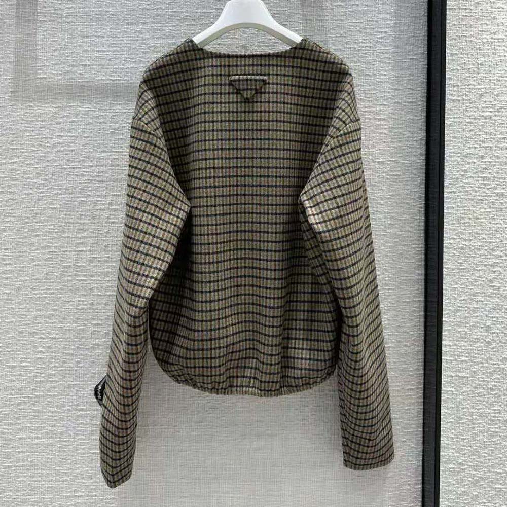 Side angle of Prada Women Cashgora Check Top showing relaxed silhouette