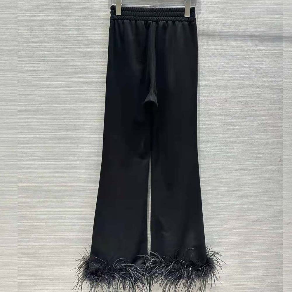 Side profile showing relaxed fit of Prada Women Cotton Fleece Joggers
