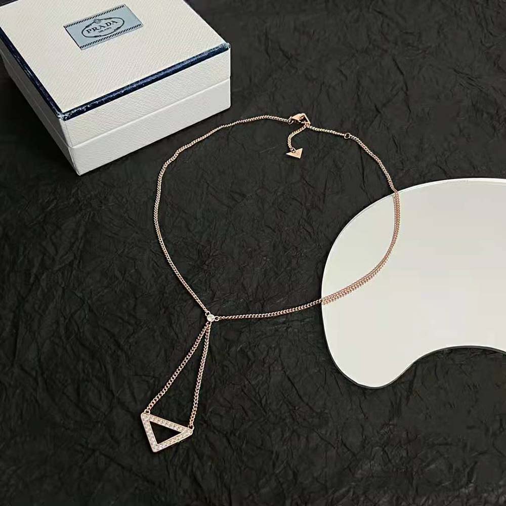 Side angle highlighting diamonds on Prada Women Eternal Gold Cut-out Pendant Necklace